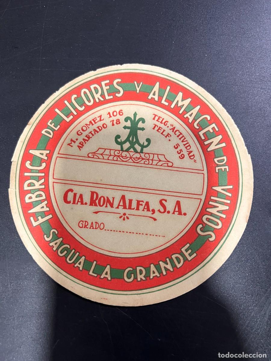 Etichette antiche: ETIQUETA. CUBA. COMPA&Ntilde;&Iacute;A RON ALFA, S.A. F&Aacute;BRICA DE LICORES Y ALMAC&Eacute;N DE VINOS. SAGUA LA GRANDE