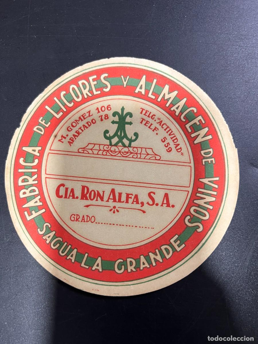 Etichette antiche: ETIQUETA. CUBA. COMPA&Ntilde;&Iacute;A RON ALFA, S.A. F&Aacute;BRICA DE LICORES Y ALMAC&Eacute;N DE VINOS. SAGUA LA GRANDE