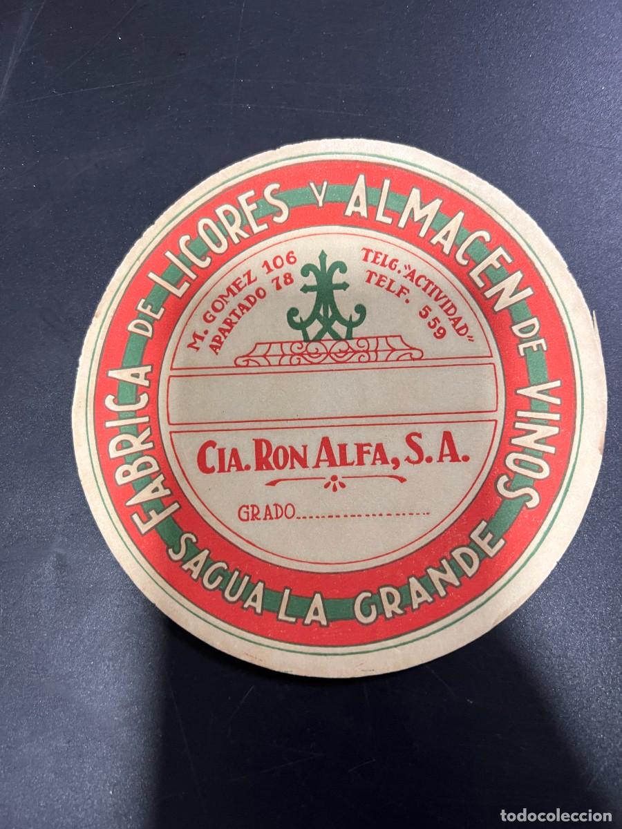 Etichette antiche: ETIQUETA. CUBA. COMPA&Ntilde;&Iacute;A RON ALFA, S.A. F&Aacute;BRICA DE LICORES Y ALMAC&Eacute;N DE VINOS. SAGUA LA GRANDE