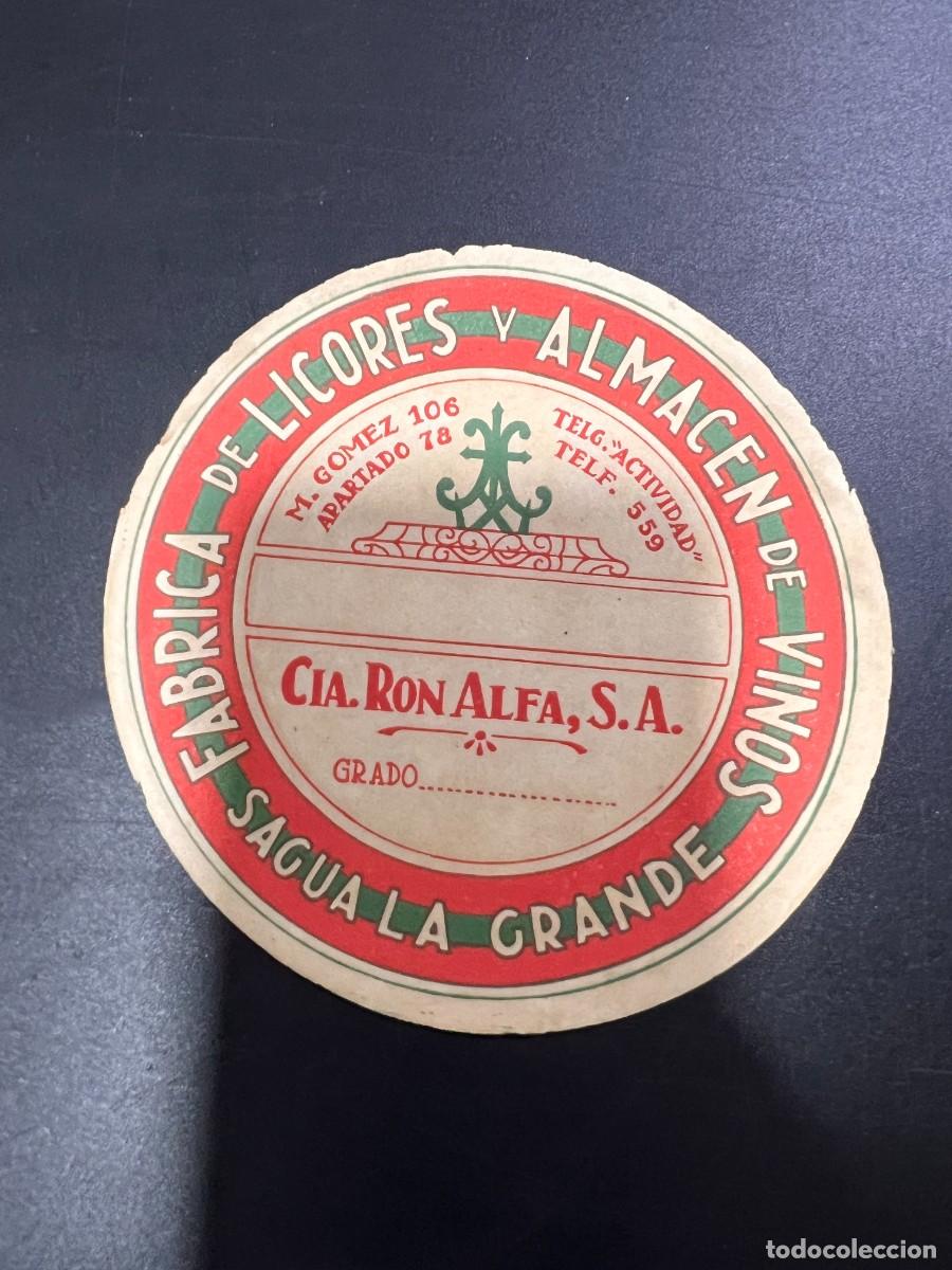 Etichette antiche: ETIQUETA. CUBA. COMPA&Ntilde;&Iacute;A RON ALFA, S.A. F&Aacute;BRICA DE LICORES Y ALMAC&Eacute;N DE VINOS. SAGUA LA GRANDE