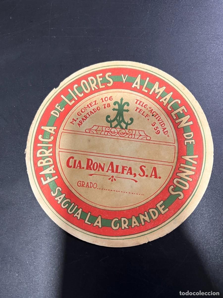 Etichette antiche: ETIQUETA. CUBA. COMPA&Ntilde;&Iacute;A RON ALFA, S.A. F&Aacute;BRICA DE LICORES Y ALMAC&Eacute;N DE VINOS. SAGUA LA GRANDE