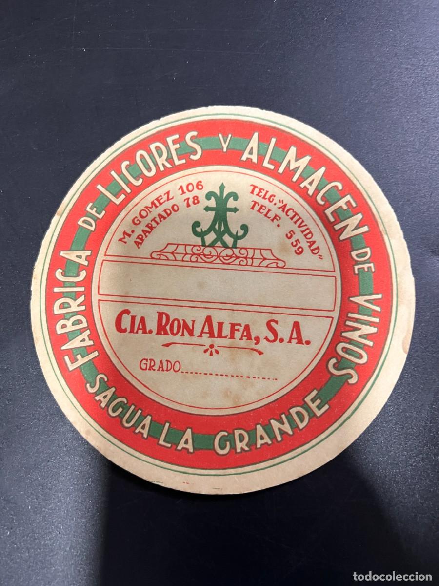 Etichette antiche: ETIQUETA. CUBA. COMPA&Ntilde;&Iacute;A RON ALFA, S.A. F&Aacute;BRICA DE LICORES Y ALMAC&Eacute;N DE VINOS. SAGUA LA GRANDE