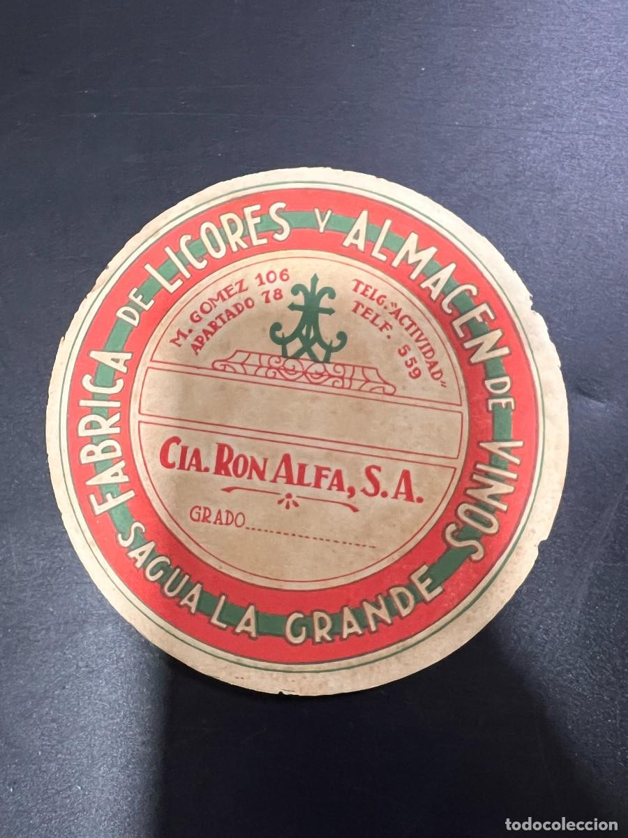 Etichette antiche: ETIQUETA. CUBA. COMPA&Ntilde;&Iacute;A RON ALFA, S.A. F&Aacute;BRICA DE LICORES Y ALMAC&Eacute;N DE VINOS. SAGUA LA GRANDE