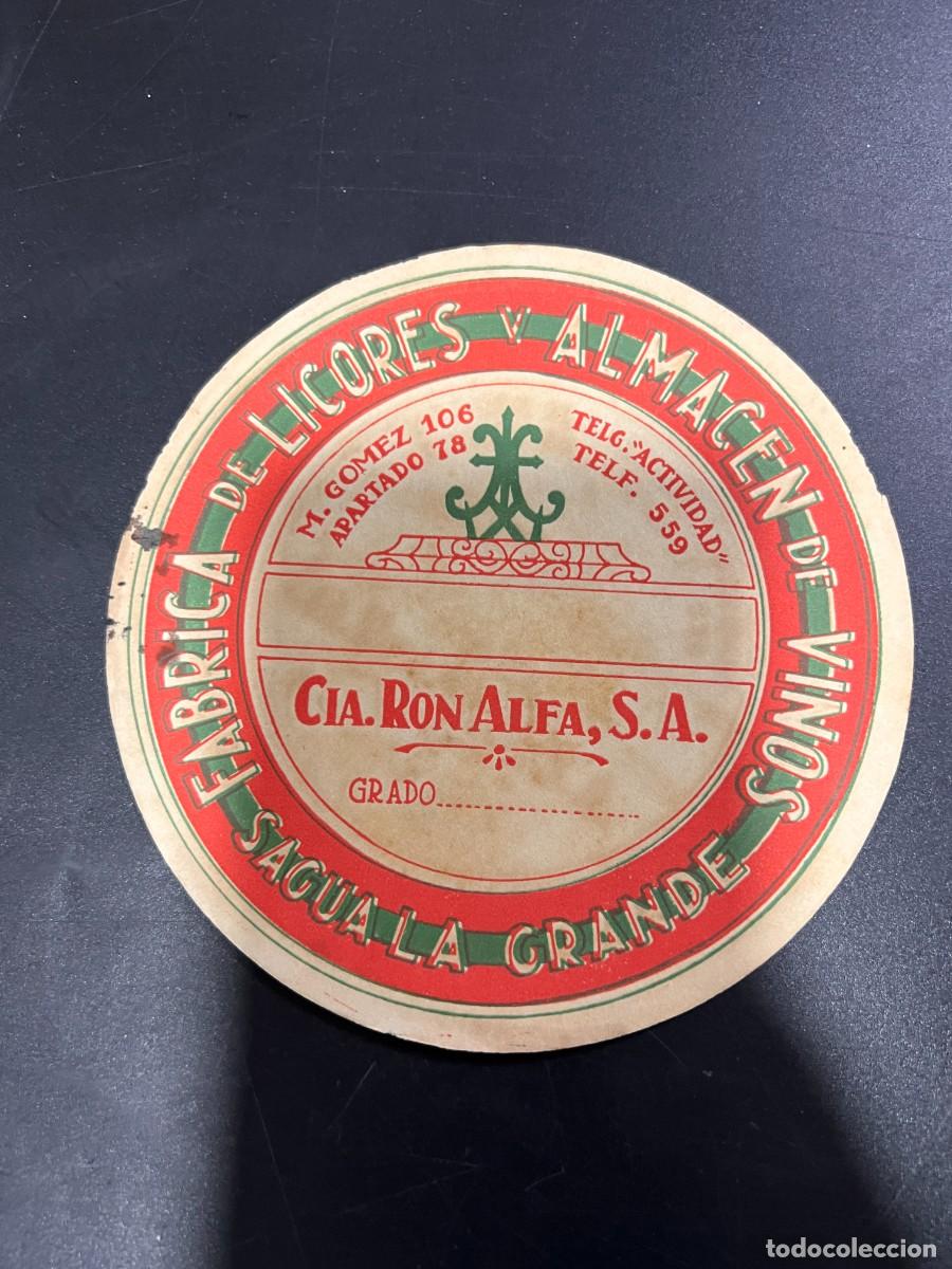 Etichette antiche: ETIQUETA. CUBA. COMPA&Ntilde;&Iacute;A RON ALFA, S.A. F&Aacute;BRICA DE LICORES Y ALMAC&Eacute;N DE VINOS. SAGUA LA GRANDE