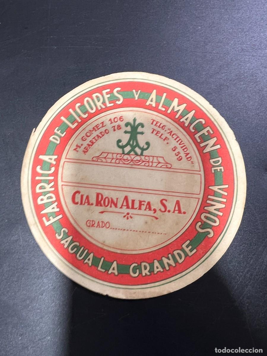 Etichette antiche: ETIQUETA. CUBA. COMPA&Ntilde;&Iacute;A RON ALFA, S.A. F&Aacute;BRICA DE LICORES Y ALMAC&Eacute;N DE VINOS. SAGUA LA GRANDE