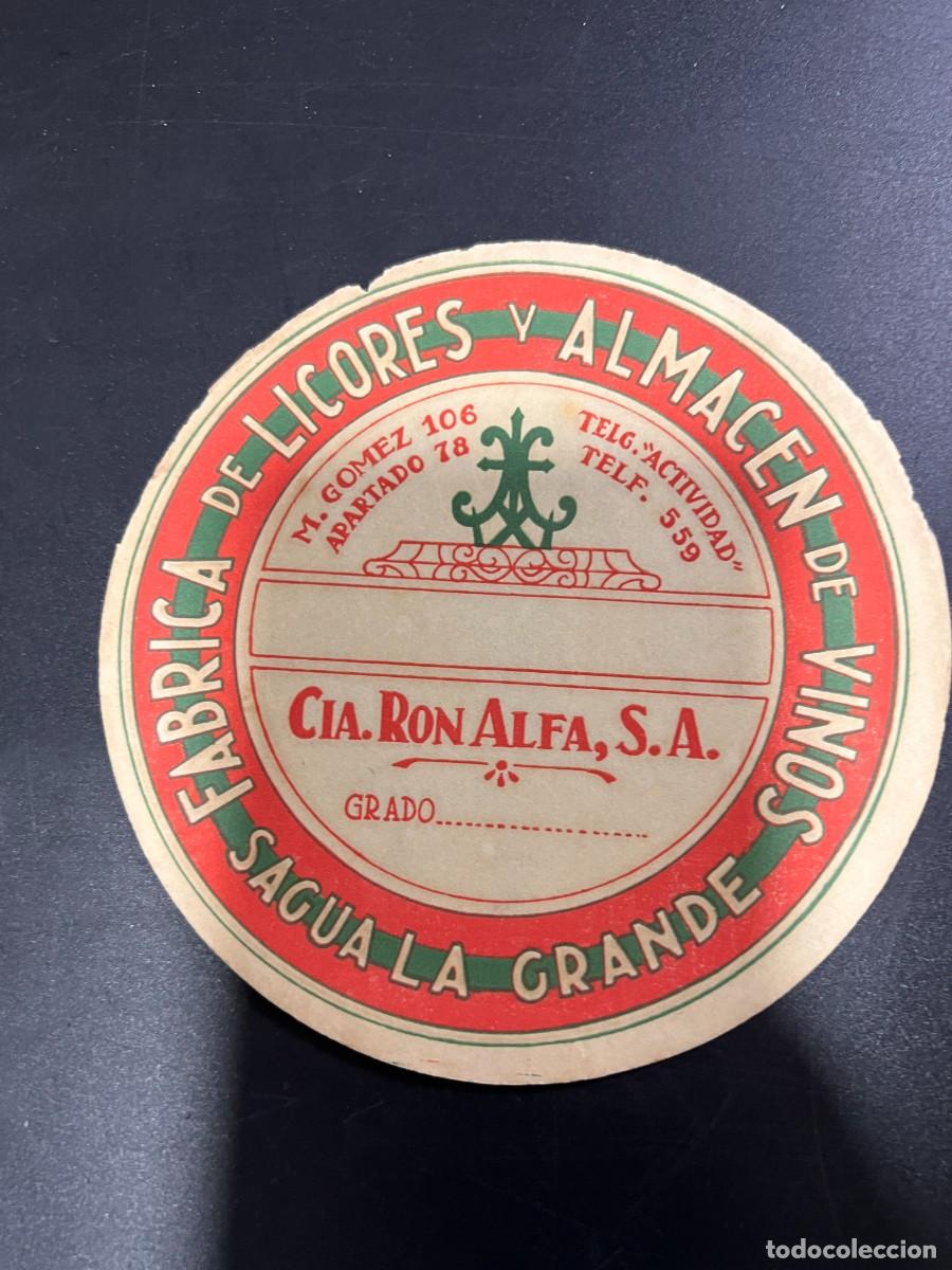 Etichette antiche: ETIQUETA. CUBA. COMPA&Ntilde;&Iacute;A RON ALFA, S.A. F&Aacute;BRICA DE LICORES Y ALMAC&Eacute;N DE VINOS. SAGUA LA GRANDE