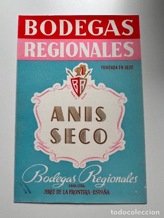 Old Labels: ETIQUETA. ANIS SECO. BODEGAS REGIONALES. JEREZ DE LA FRA. MEDIDAS APROX.: 15.5 X 10.5 CM