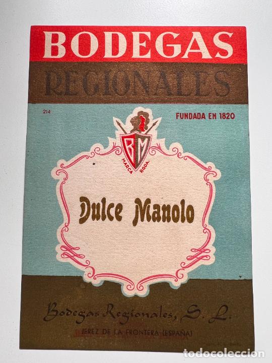 Old Labels: ETIQUETA. DULCE MANOLO. BODEGAS REGIONALES. JEREZ DE LA FRA. MEDIDAS APROX.: 15.5 X 10.5 CM