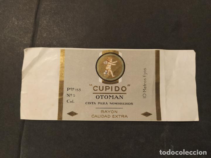 Etiquetas antiguas: CUPIDO OTOMAN-CINTA PARA SOMBREROS-ETIQUETA ANTIGUA-VER FOTOS-(K-11.004)