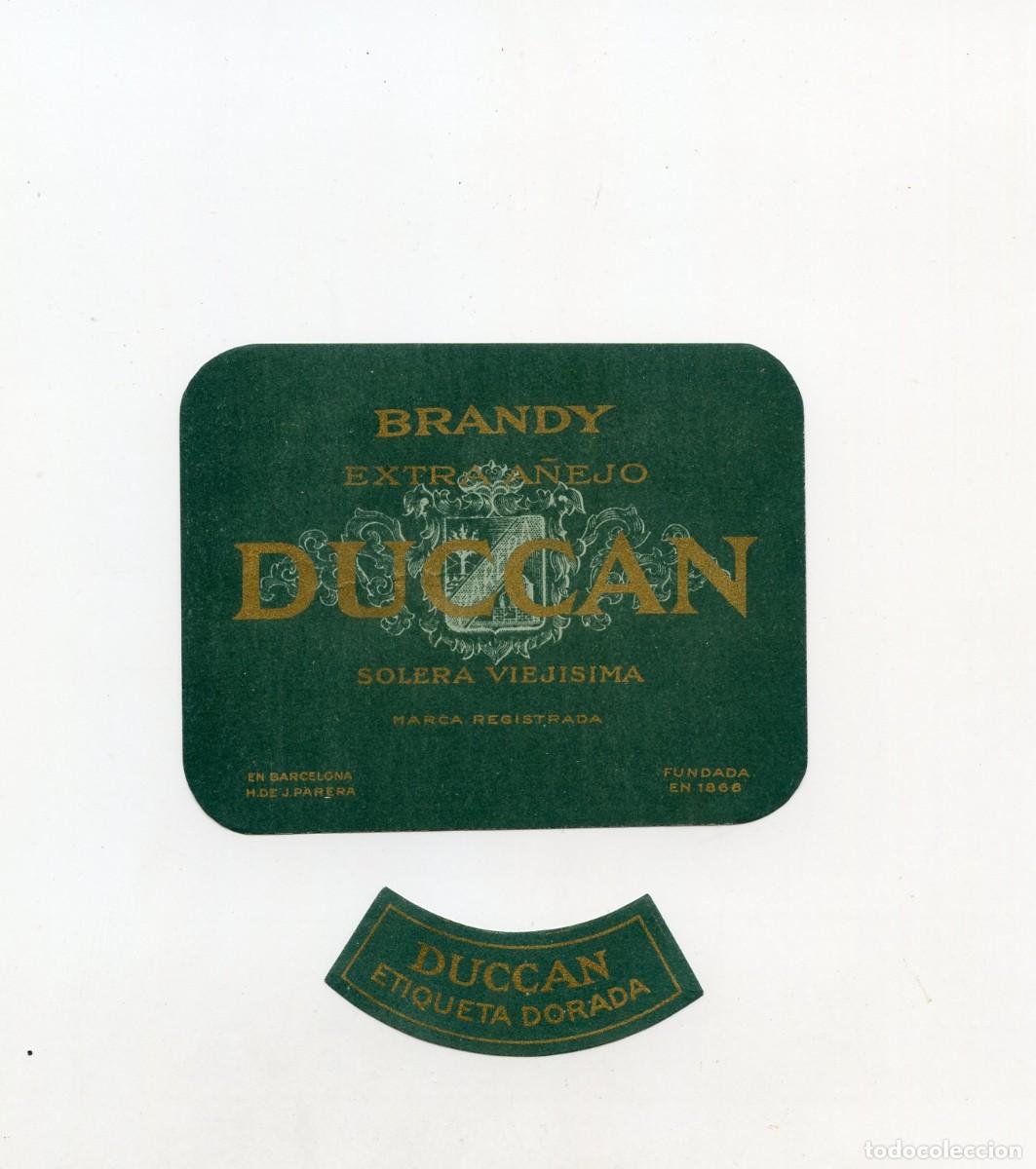 Etiquetas antiguas: Dos etiquetas antiguas Brandy Duccan &rdquo;Solera viej&iacute;sima&rdquo; Destilerias Parera, Barcelona