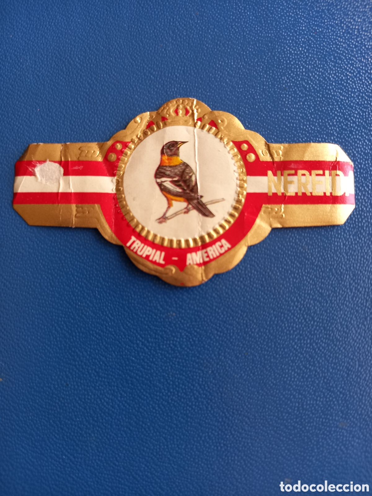 Etiquetas antiguas: VITOLA NEREIDA - SERIE AVES, TRUPIAL AM&Eacute;RICA. 6,5x3,5 cm