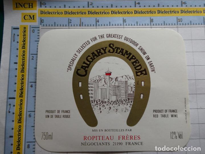 Etichette antiche: ETIQUETA DE BEBIDAS. VINO LICORES. FRANCIA. CALGARY STAMPEDE . 1022