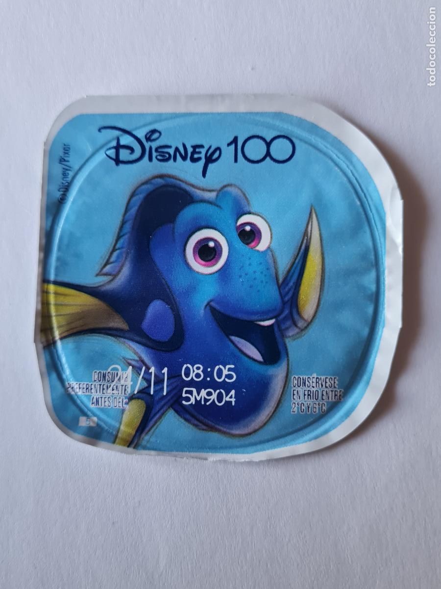 Etiquetas antiguas: DORY - BUSCANDO A NEMOS DISNEY 100 ANIVERSARIO - TAPA YOGUR DANONE SABORES - 2023