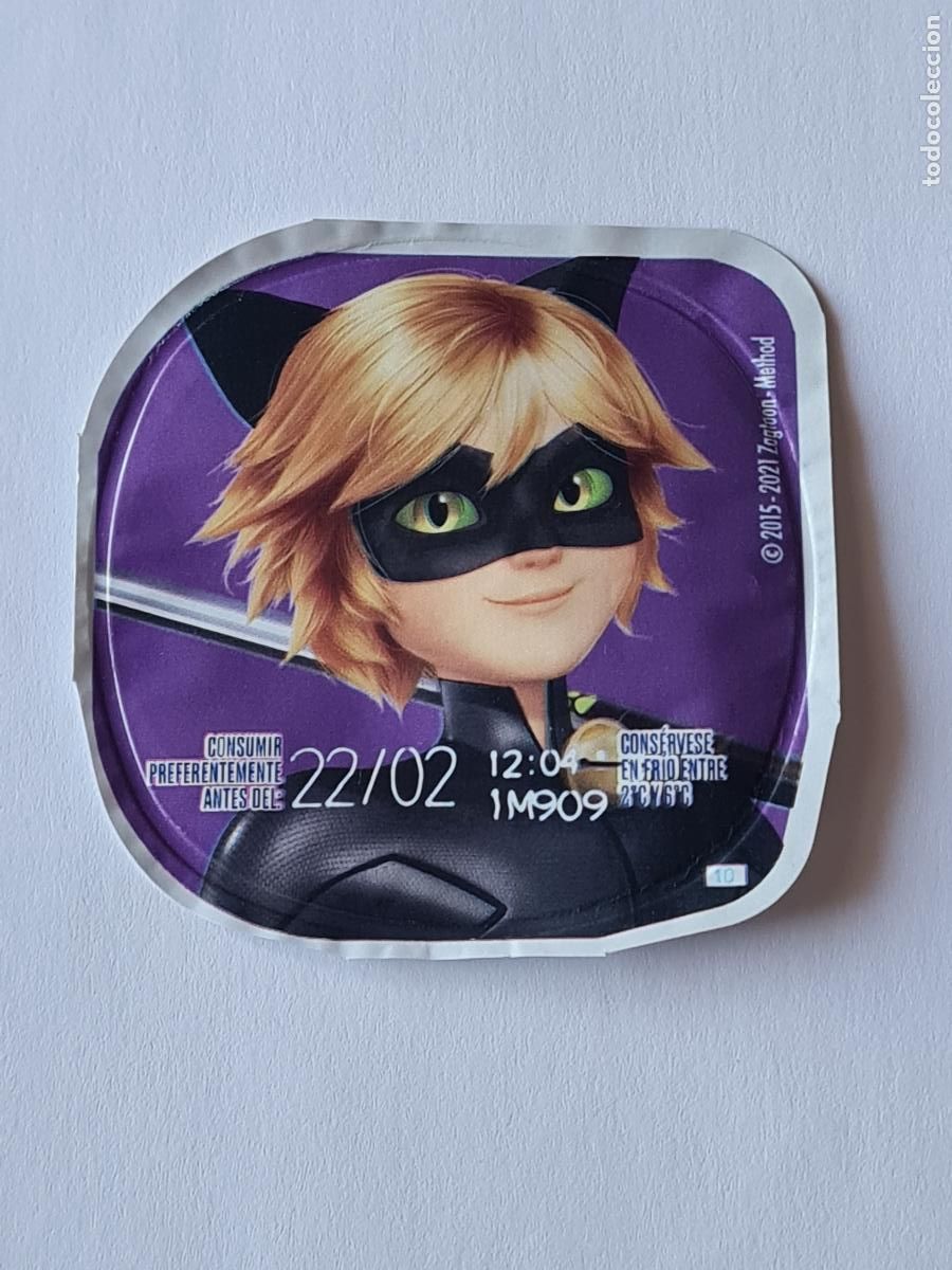 Etiquetas antiguas: CAT NOIR FONDO MORADO/TIKKI REVERSO - TAPA YOGUR DANONE SABORES - MIRACOLOUS/LADYBUG 2023