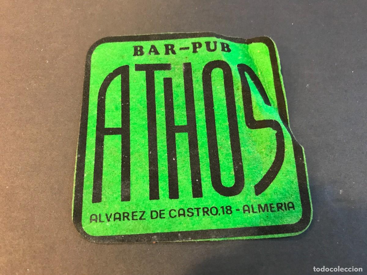 Old Labels: POSAVASOS DE TELA. BAR-PUB ATHOS. ALMER&Iacute;A. 8X8 CM