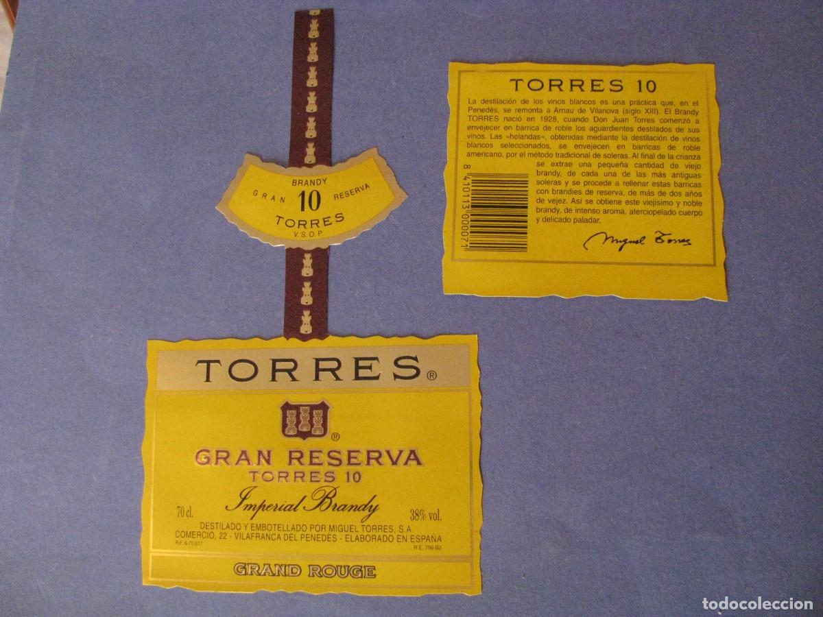 Etiquetas antiguas: MIGUEL TORRES S. A. ETIQUETA MAS CONTRAETIQUETA DE GRAN RESERVA TORRES 10. IMPERIAL BRANDY.