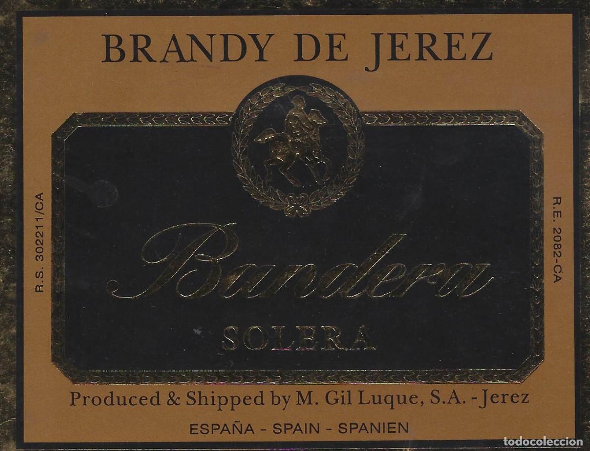 Etiquetas antiguas: E612 BODEGAS M. GIL LUQUE-BRANDY BANDERA - Foto 1