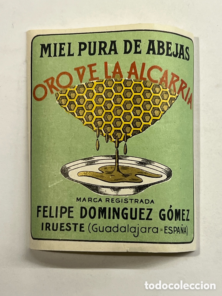 Etiquetas antiguas: ORO DE LA ALCARRIA. Miel pura de abejas. IRUESTE (Guadalajara) Med&iacute;das: 9 x 8 cm