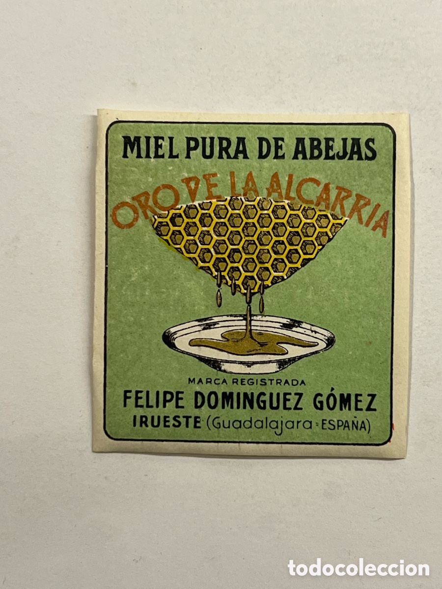 Etiquetas antiguas: ORO DE LA ALCARRIA. Miel pura de abejas. IRUESTE (Guadalajara) Med&iacute;das: 5 x 5 cm