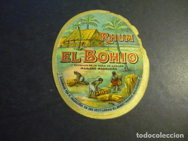 Etiquetas antiguas: ANTIGUA ETIQUETA CROMOLITOGRAFICA RON EL BOHIO MARIANO MADRUE&Ntilde;O MADRID 9 X 7 CM