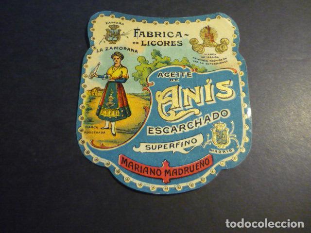 Etiquetas antiguas: ANTIGUA ETIQUETA CROMOLITOGRAFICA ANIS LA ZAMORANA MARIANO MADRUE&Ntilde;O MADRID 9 X 10 CM MUJER DE ZAMORA