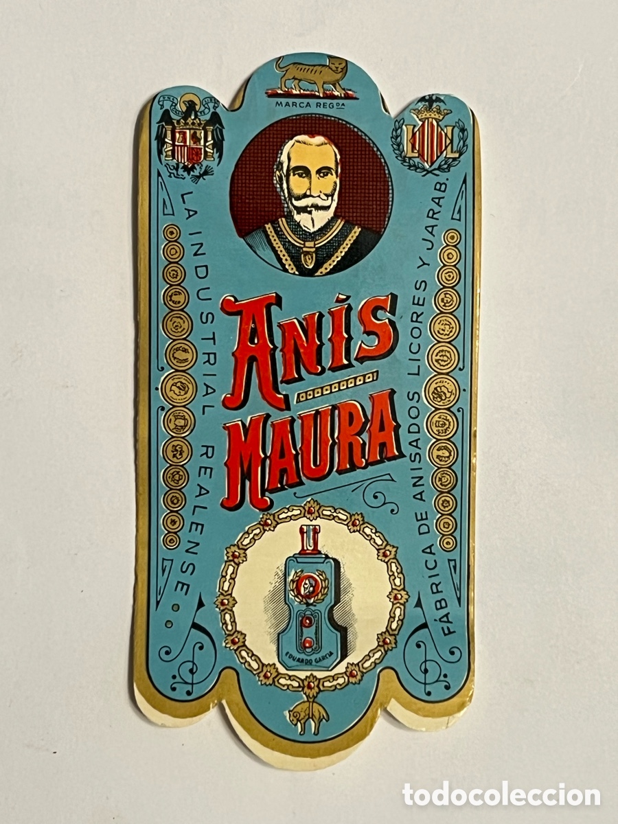 Etiquetas antiguas: AN&Iacute;S MAURA. Etiqueta con emblemas de la Ciudad de Valencia y Escudo &Aacute;guila de San Juan. Original