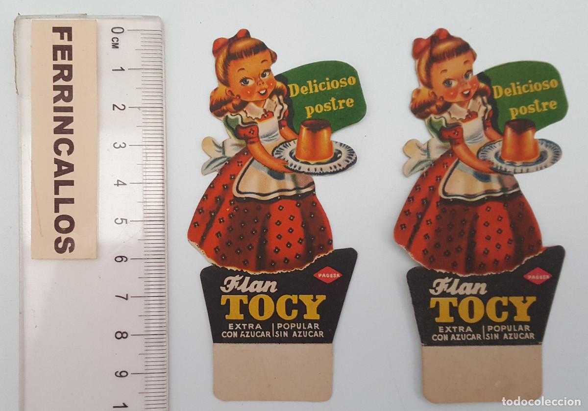 Etiquetas antiguas: LOTE 2 ETIQUETAS TROQUELADAS CON PESTA&Ntilde;A FLAN TOCY (NATILLINA), N&Uacute;MEROS 5 Y 9, NUEVAS