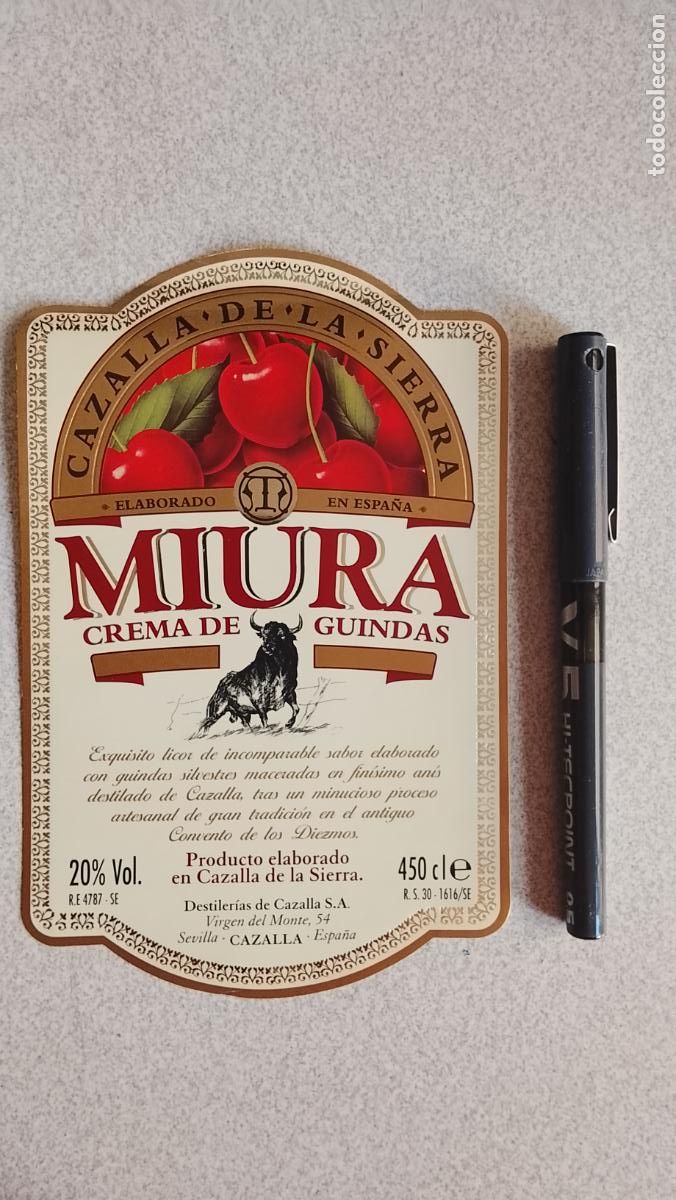 Etiquetas antiguas: Haga su oferta etiqueta - CAZALLA DE LA SIERRA MIURA CREMA DE GUINDAS SEVILLA