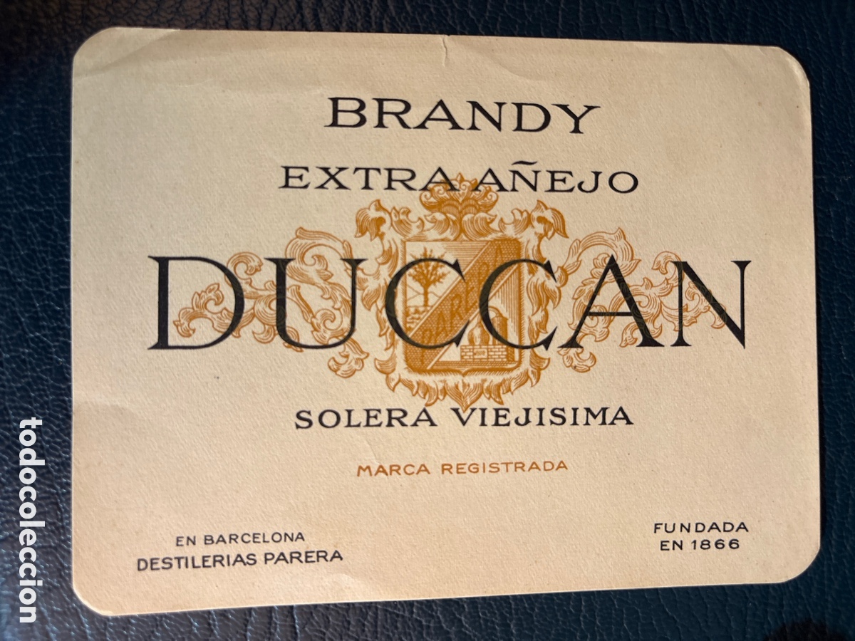 Etiquetas antiguas: ETIQUETA PARA BOTELLA BRANDY EXTRA A&Ntilde;EJO DUCCAN SOLERA VIEJISIMA ( DESTILER&Iacute;AS PARERA )