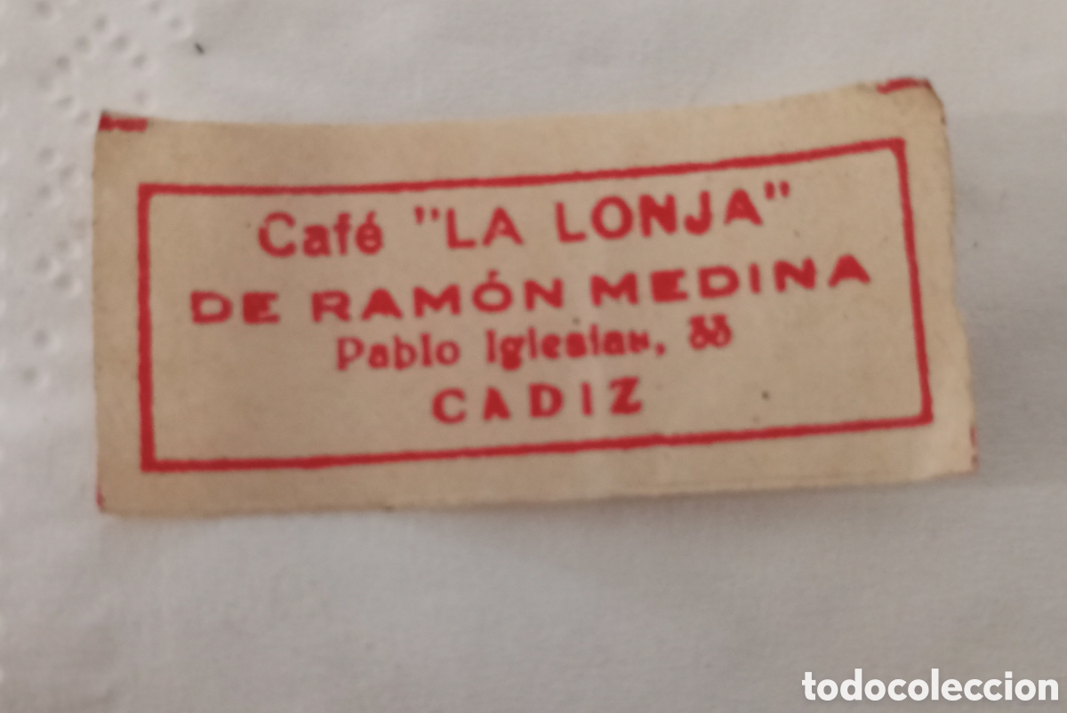 Etiquetas antiguas: C&aacute;diz peque&ntilde;o etiqueta caf&eacute; la lonja.a&ntilde;os 30. Mide 4x 2 cms