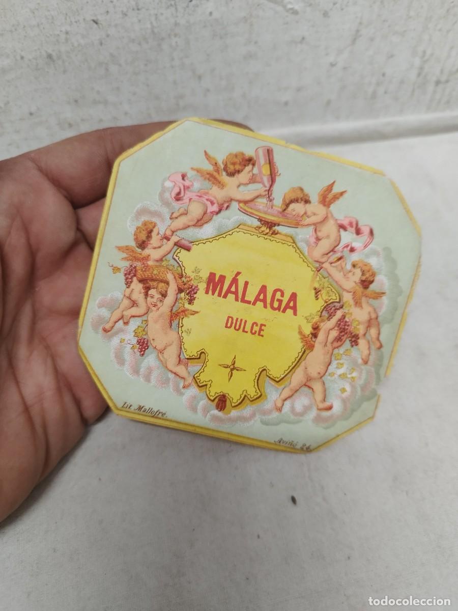 Etiquetas antiguas: Antigua etiqueta de Vino M&aacute;laga Dulce Litograf&iacute;a Mallofr&eacute;, del siglo XIX.