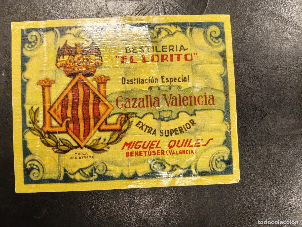 Etiquetas antiguas: ETIQUETA CAZALLA VALENCIANA - DESTILERIA EL LORITO / MIGUEL QUILES - BENETUSER ( VALENCIA )