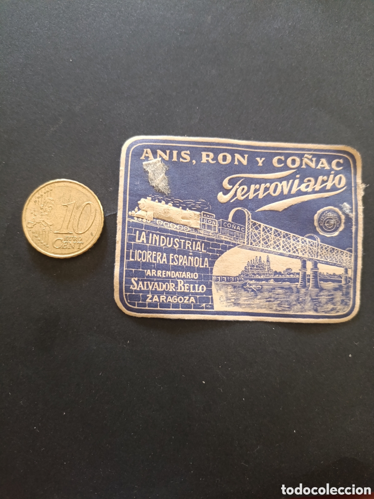 Etiquetas antiguas: ANIS , RON Y CO&Ntilde;AC FERROVIARIO ZARAGOZA [ ETIQUETAS A&Ntilde;OS 40-50 ]