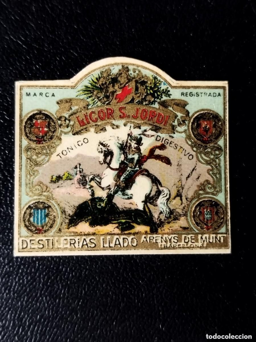 Old Labels: Antigua etiqueta de licor sant Jordi destiler&iacute;as Llad&oacute; Arenys de Munt 4x 3 cm