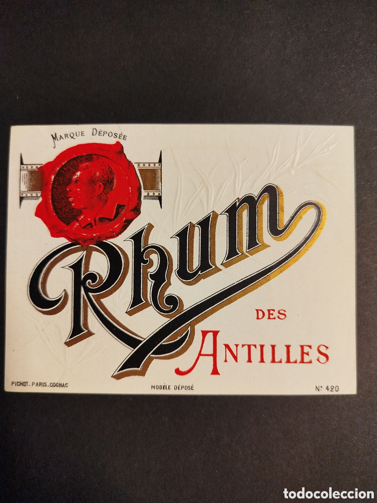 Etiquetas antiguas: RHUM DES ANTILLES CON RELIEVES