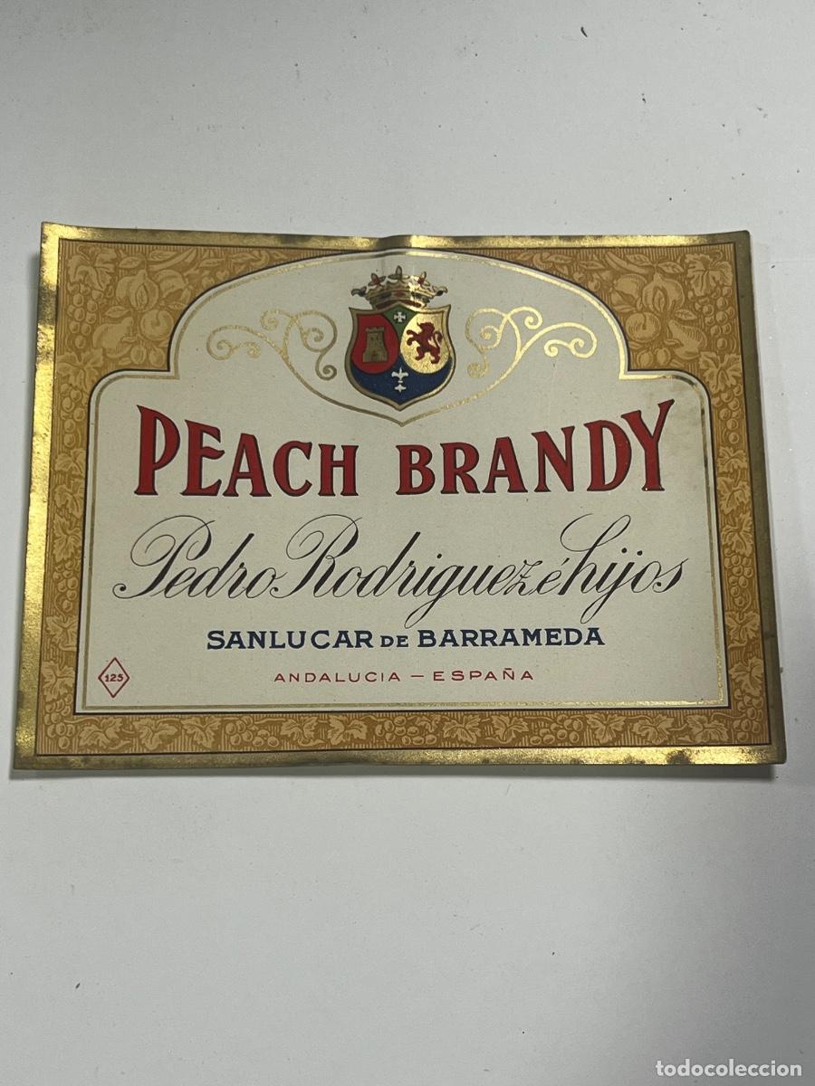 Etichette antiche: ETIQUETA. PEACH BRANDY. PEDRO RODR&Iacute;GUEZ E HIJOS. SANLUCAR DE BARRAMEDA. ANDALUC&Iacute;A-ESPA&Ntilde;A.