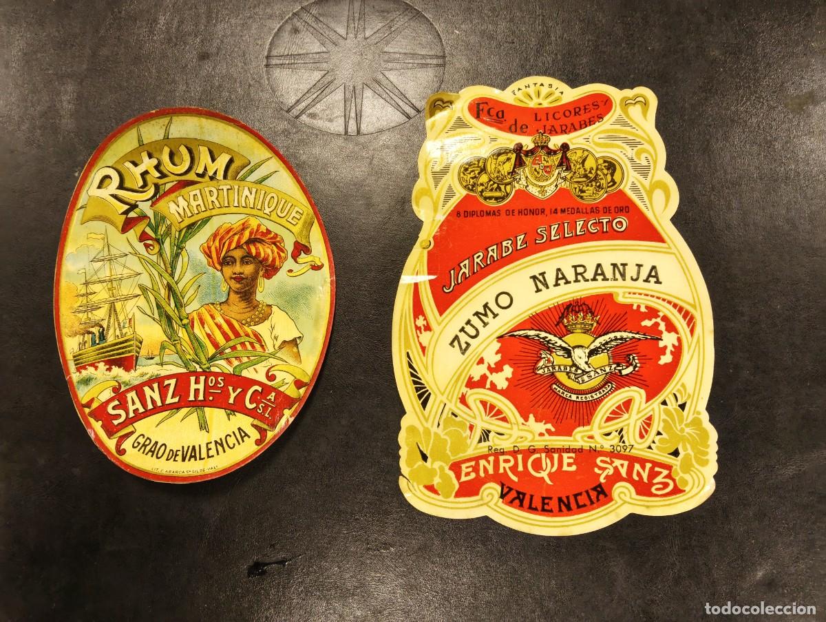 Etiquetas antiguas: 2 ANTIGUAS ETIQUETAS LICORES Y JARABES ENRIQUE SANZ GRAO VALENCIA ZUMO NARANJA RHUM / RON MARTINIQUE