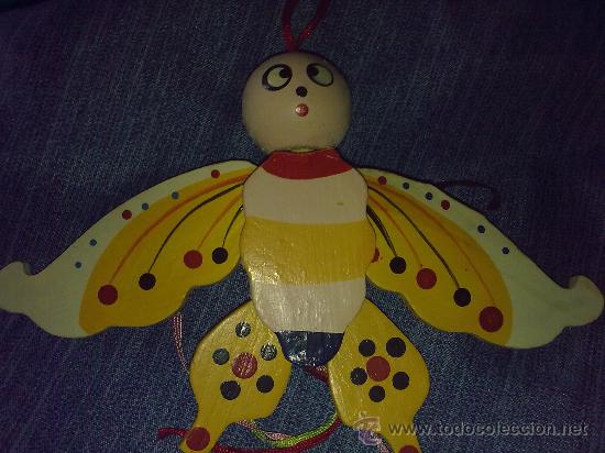 Figurines d'action: Mariposa Simp&aacute;tica..con carilla de susto.Madera.Alas abatibles.Para colgar.19 cms alitas desplegadas