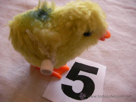Figuras de a&ccedil;&atilde;o: ANTIGUO POLLITO A CUERDA