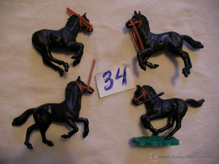 Figuras de acci&oacute;n: LOTE DE ANTIGUOS CABALLOS NEGROS - Foto 1