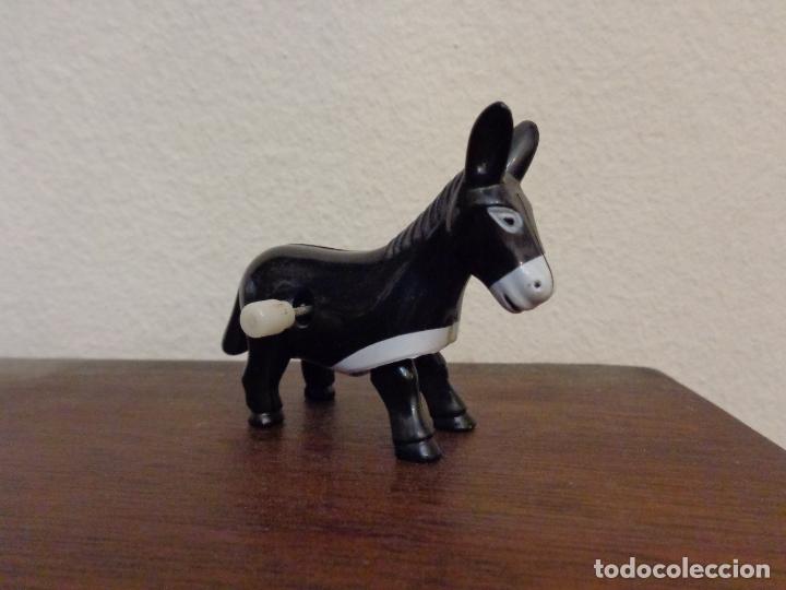 Figurines d'action: Burro a cuerda, pero no funciona