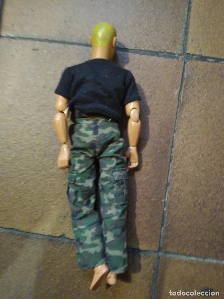 Figuras de acci&oacute;n: Mu&ntilde;eco. Incluye ropa y cintur&oacute;n. - Foto 3