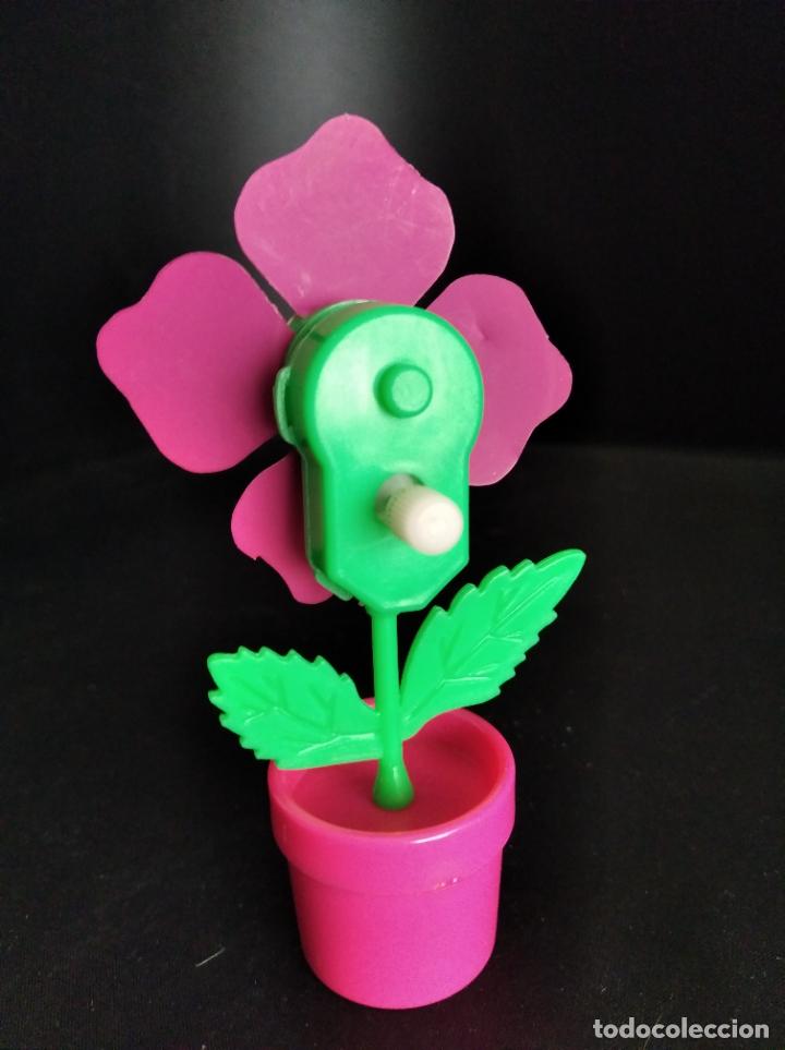 Figuras de acci&oacute;n: FLOR MACETA - FIGURA A CUERDA - FUNCIONANDO - Foto 2