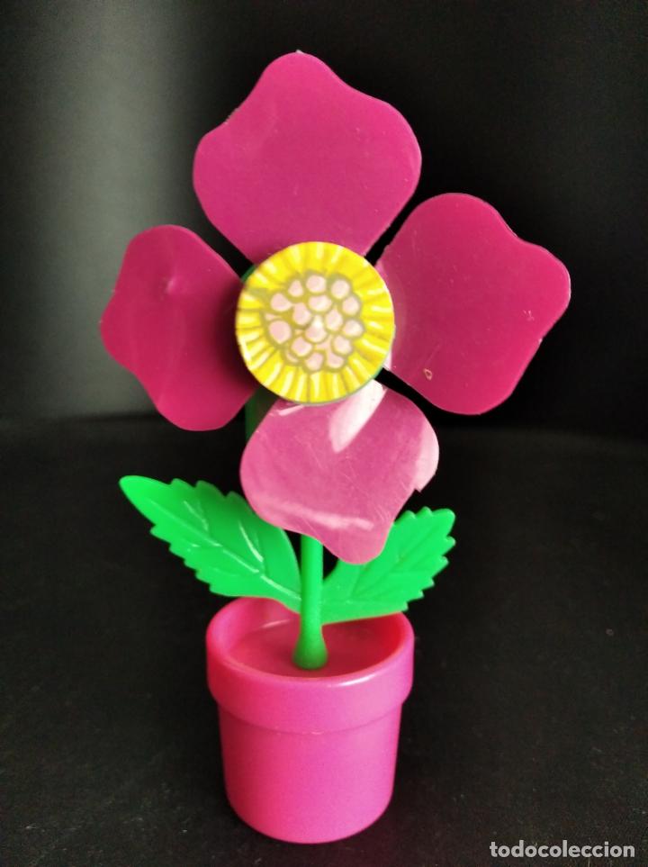 Figuras de acci&oacute;n: FLOR MACETA - FIGURA A CUERDA - FUNCIONANDO - Foto 1