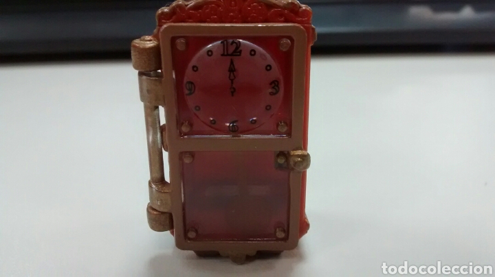 Actionfiguren: RELOJ DE PARED