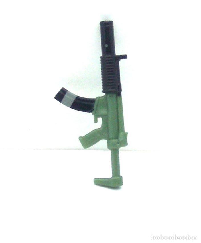 Figurines d'action: Peque&ntilde;a Arma Fabricada en Pl&aacute;stico para Figura de Acci&oacute;n .