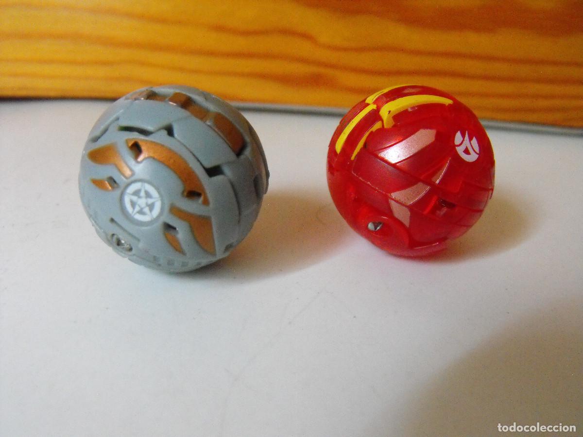 Figuras de acci&oacute;n: Dos bolas robot transformer. - Foto 1