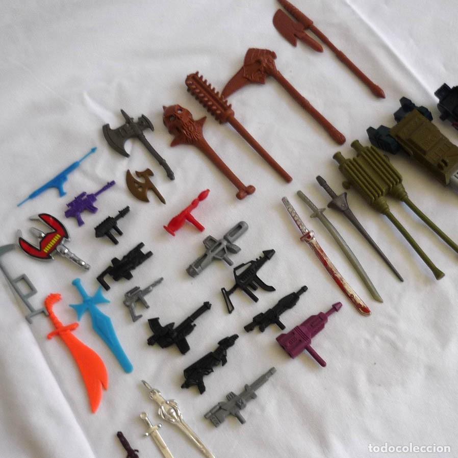 Figuras de acci&oacute;n: Conjunto de armas varias Master Universo, Star Wars, .... - Foto 1