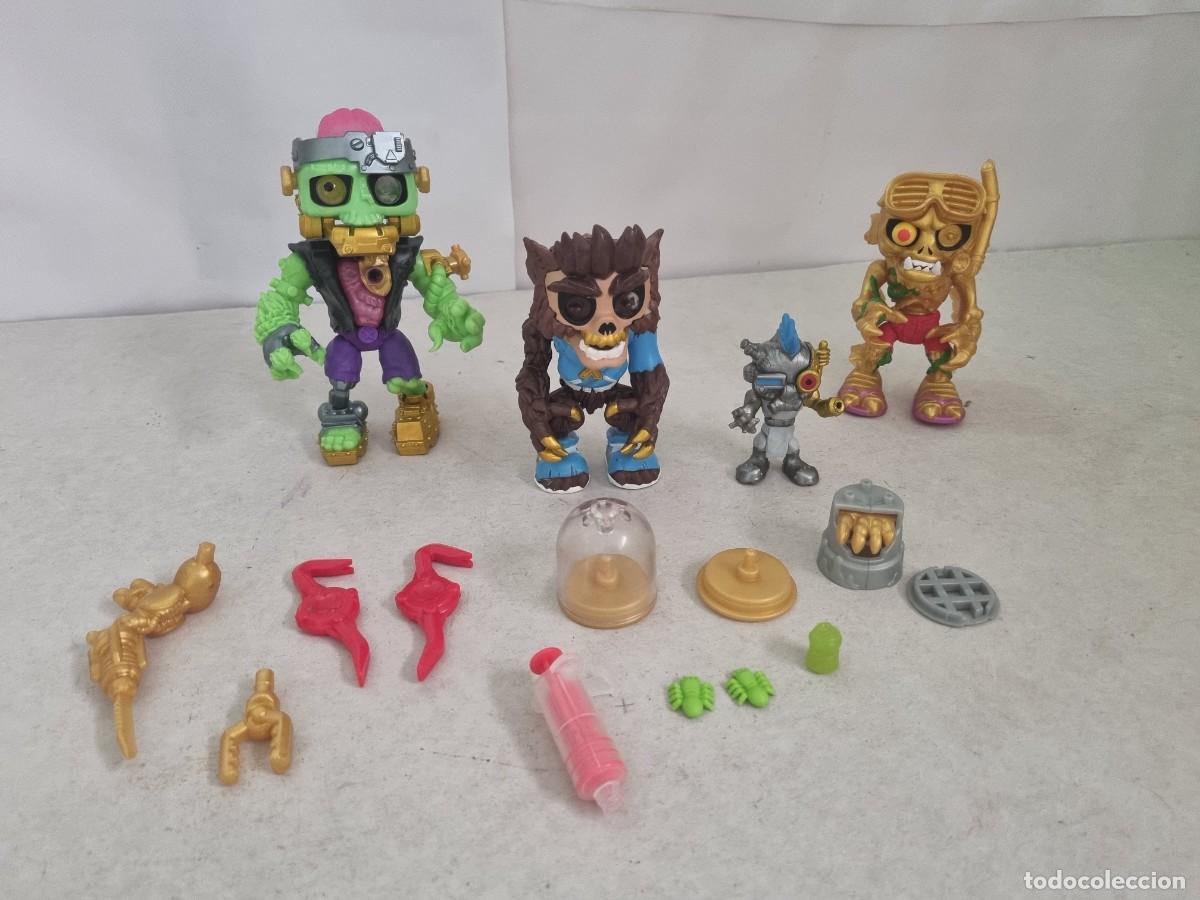 Figuras de acci&oacute;n: Lote de 4 Monstruos Treasure y accesorios