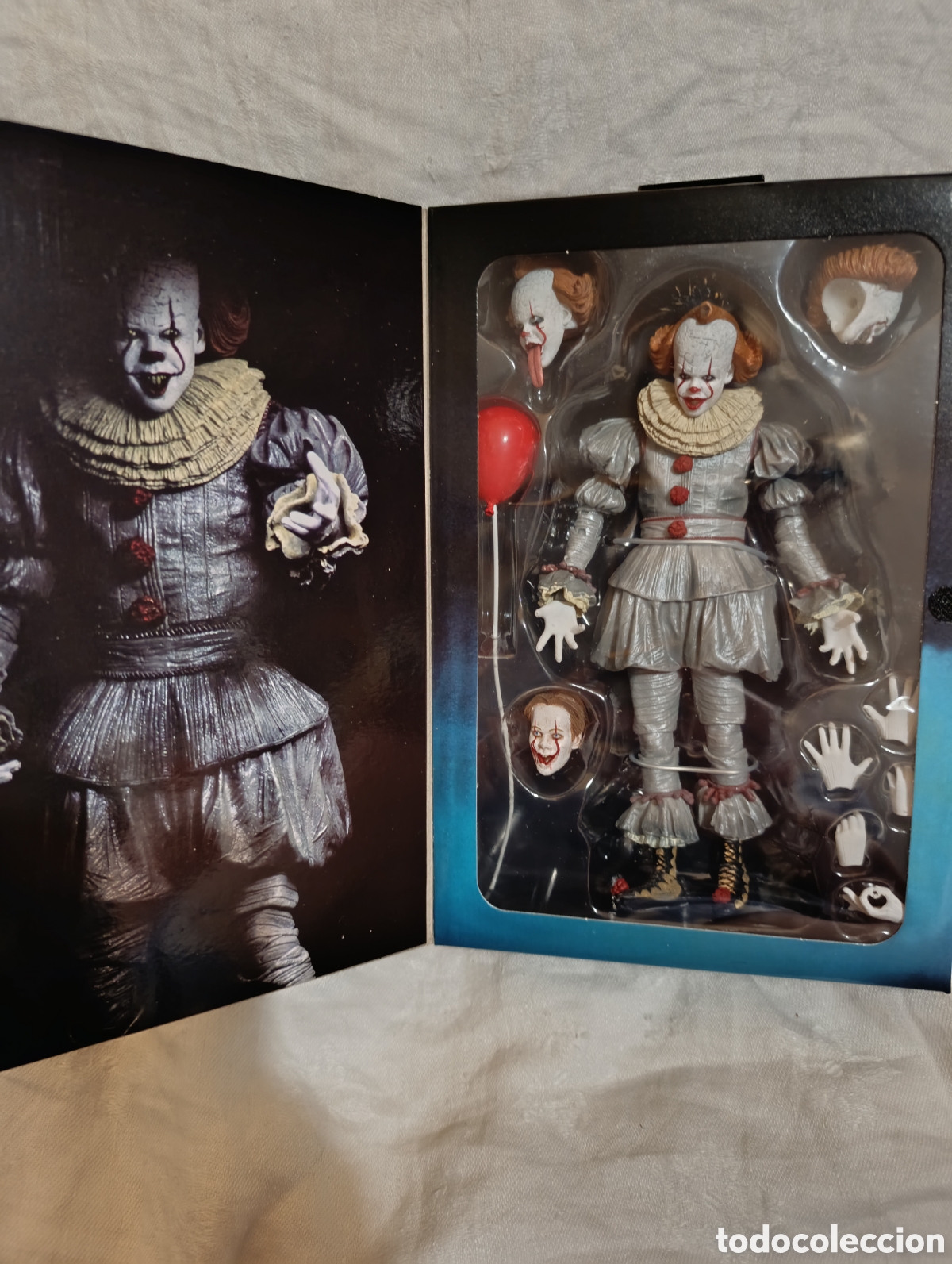 Figuras de acci&oacute;n: Figura coleccionable de Pennywise de la pel&iacute;cula It Cap&iacute;tulo 2,de NECA.